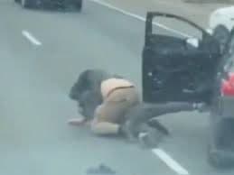 Two men aggressively have sex with each other in road rage incident.